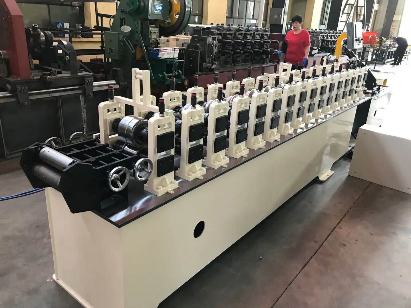 How a hat channel roll forming machine differs from purlin lines